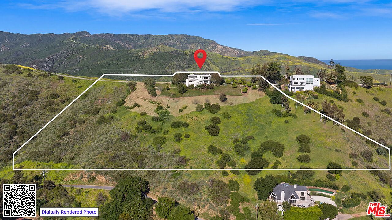 Aerial view of the 5.26-acre lot showing the property boundary across rolling Malibu hillside with the ocean visible to the south